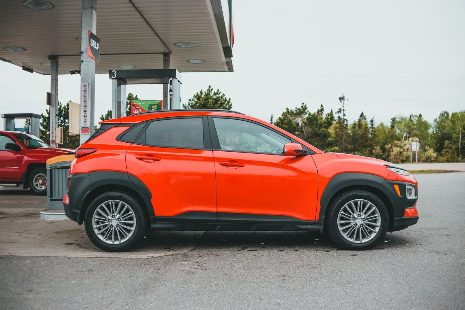Bright orange SUV parked