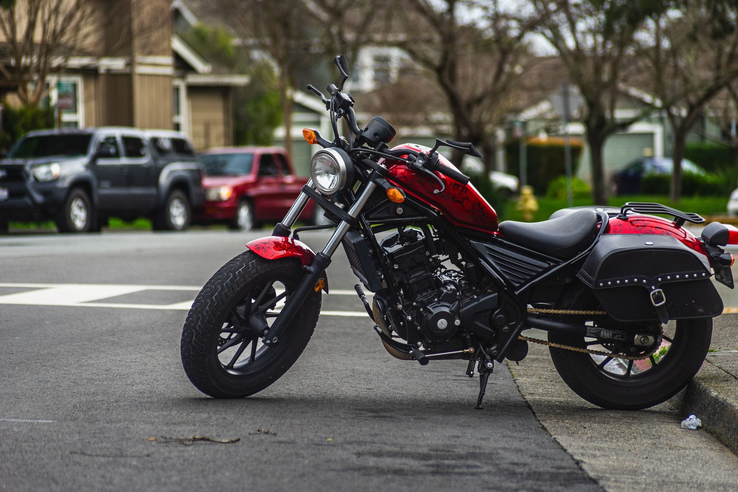 A red cruiser motorcycle, the kind of bike we load for motorcycle towing